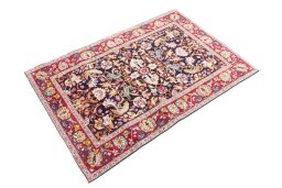 Corner detail of 2000s Kashan rug showing border pattern and Wool pile
