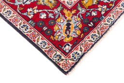 Central medallion detail of 2000s Kashan rug from Iran / Persia