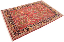 Corner detail of 1970s Kashan rug showing border pattern and Wool pile