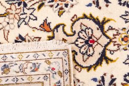 Full view of 1988s Kashan rug from Iran / Persia, 293 × 195 cm in Beige tones