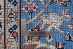 Surface texture of 1950s Kashan rug with natural Wool and intricate pattern