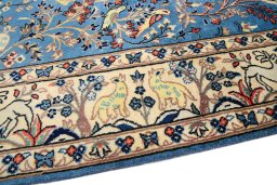 Backside of handmade 1950s Kashan rug showing knot structure and weave density