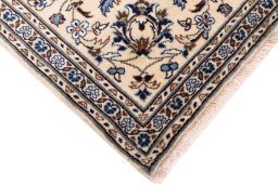 Close-up detail of 2000s Kashan rug from Iran / Persia showing Wool weave