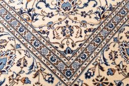 Full view of 2000s Kashan rug from Iran / Persia, 297 × 195 cm in Beige tones