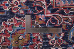 Surface texture of 2000s Kashan rug with natural Wool and intricate pattern