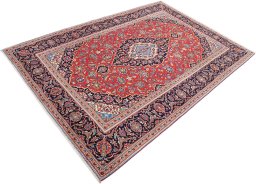 Corner detail of 2000s Kashan rug showing border pattern and Wool pile