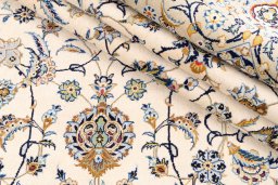 Close-up detail of 1989s Kashan rug from Iran / Persia showing Wool weave