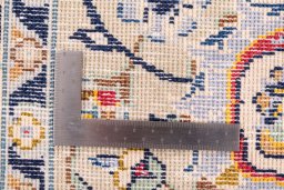 Surface texture of 1989s Kashan rug with natural Wool and intricate pattern