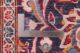 Close-up detail of 1980s Kashan rug from Iran / Persia showing Wool weave