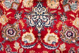 Close-up detail of 1980s Kashan rug from Iran / Persia showing Wool weave