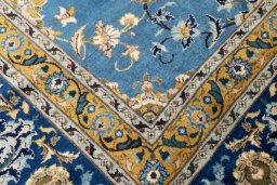 Close-up detail of 1973s Kashan rug from Iran / Persia showing Wool weave