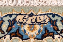 Corner detail of 1975s Kashan rug showing border pattern and Wool pile