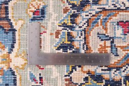 Backside of handmade 1975s Kashan rug showing knot structure and weave density