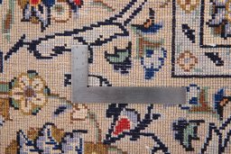 Surface texture of 2000s Kashan rug with natural Wool and intricate pattern
