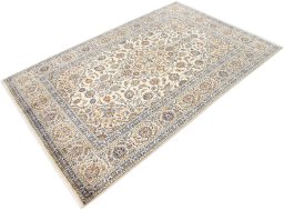 Corner detail of 2000s Kashan rug showing border pattern and Wool pile