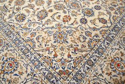Close-up detail of 2000s Kashan rug from Iran / Persia showing Wool weave