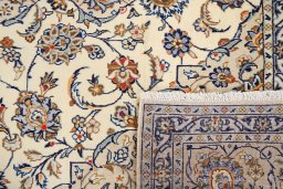 Full view of 2000s Kashan rug from Iran / Persia, 300 × 198 cm in Cream tones