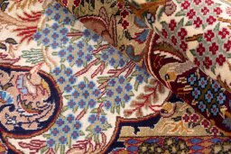 Close-up detail of 1975s Kashan rug from Iran / Persia showing Wool weave