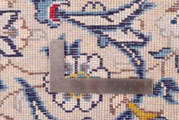 Close-up detail of 1983s Kashan rug from Iran / Persia showing Wool weave