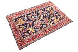 Corner detail of 1980s Kashan rug showing border pattern and Wool pile