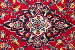 Full view of 2000s Kashan rug from Iran / Persia, 154 × 96 cm in Red tones