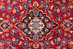 Full view of 2000s Kashan rug from Iran / Persia, 150 × 100 cm in Red tones