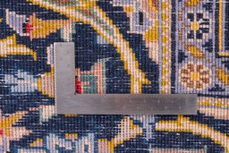 Close-up detail of 2003s Kashan rug from Iran / Persia showing Wool weave