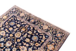 Surface texture of 2003s Kashan rug with natural Wool and intricate pattern