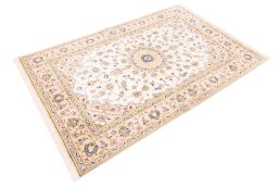 Corner detail of 2003s Kashan rug showing border pattern and Wool pile