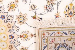 Close-up detail of 2003s Kashan rug from Iran / Persia showing Wool weave