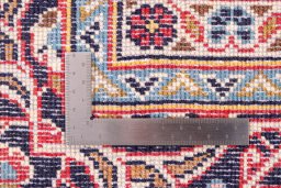 Surface texture of 1975s Kashan rug with natural Wool and intricate pattern