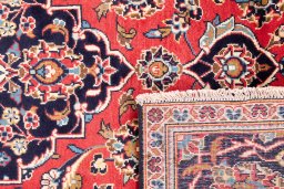 Full view of 1975s Kashan rug from Iran / Persia, 285 × 190 cm in Red tones
