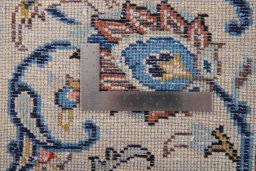 Surface texture of 1985s Kashan rug with natural Wool and intricate pattern