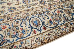Backside of handmade 1985s Kashan rug showing knot structure and weave density