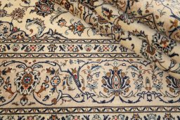 Close-up detail of 1990s Kashan rug from Iran / Persia showing Wool weave