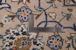 Surface texture of 1990s Kashan rug with natural Wool and intricate pattern