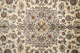 Full view of 1990s Kashan rug from Iran / Persia, 298 × 210 cm in Cream tones