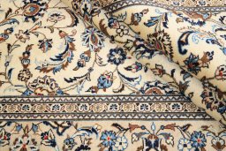 Close-up detail of 2000s Kashan rug from Iran / Persia showing Wool weave