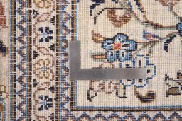 Surface texture of 2000s Kashan rug with natural Wool and intricate pattern