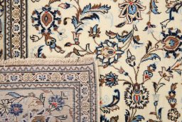 Full view of 2000s Kashan rug from Iran / Persia, 300 × 196 cm in Cream tones
