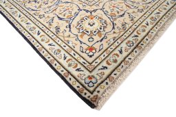 Central medallion detail of 2000s Kashan rug from Iran / Persia