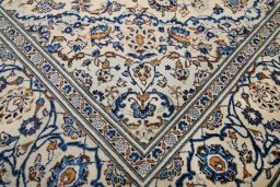 Full view of 2000s Kashan rug from Iran / Persia, 300 × 196 cm in Cream tones