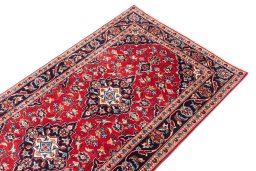 Surface texture of 1996s Kashan rug with natural Wool and intricate pattern