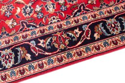 Backside of handmade 1996s Kashan rug showing knot structure and weave density