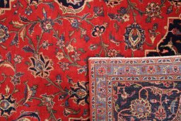 Full view of 2000s Kashan rug from Iran / Persia, 300 × 200 cm in Red tones