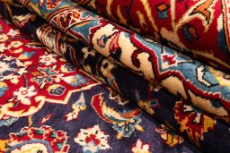 Close-up detail of 1990s Kashan rug from Iran / Persia showing Wool weave