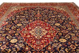Full view of 1990s Kashan rug from Iran / Persia, 395 × 305 cm in Dark blue tones