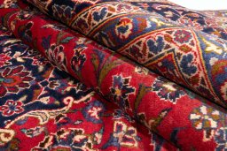 Surface texture of 1990s Kashan rug with natural Wool and intricate pattern