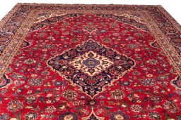 Full view of 1990s Kashan rug from Iran / Persia, 380 × 280 cm in Red tones