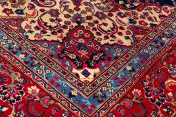 Backside of handmade 1990s Kashan rug showing knot structure and weave density